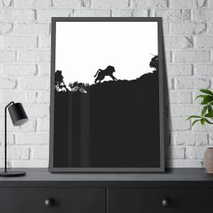 photo on a wall of black and white of baboon running along a ridge