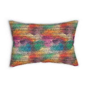 Sheet music over colored brush strokes pattern on cushion